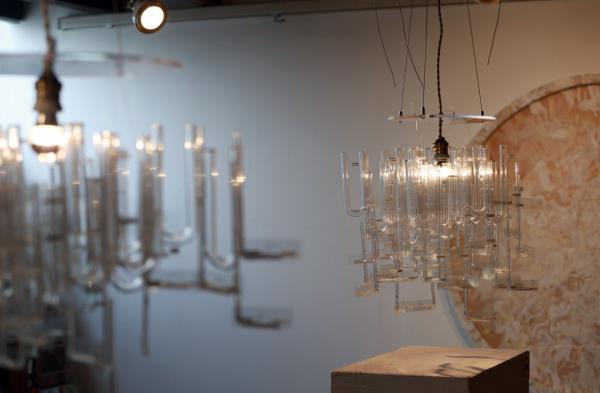 Ng's installation 'Luminous Matter', comprising laboratory instruments made of glass and microscope slides with plant and animal specimens that have been meticulously labelled. Photo: The Star/Chan Tak Kong 