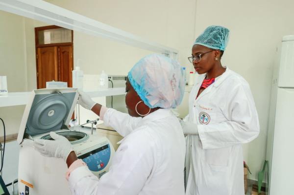 Yadang,(right) and Da?rou, working in a research laboratory at the Institute of Medical Research and Medicinal Plant Studies in Yaounde. 