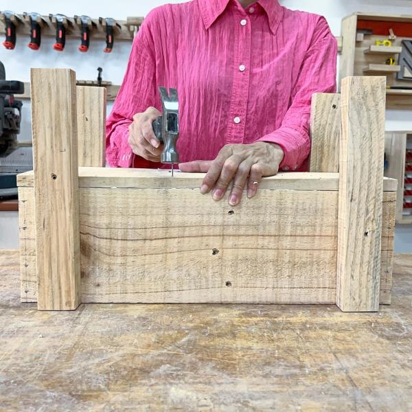 Finish up your planter by attaching the bottom with glue and nails.