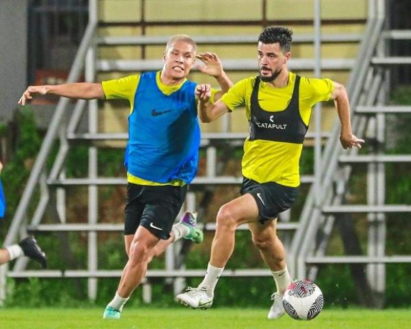 Stepping up: Coach Kim Pan-gon hopes the senior players like Paulo Josue (right) can guide the younger players.