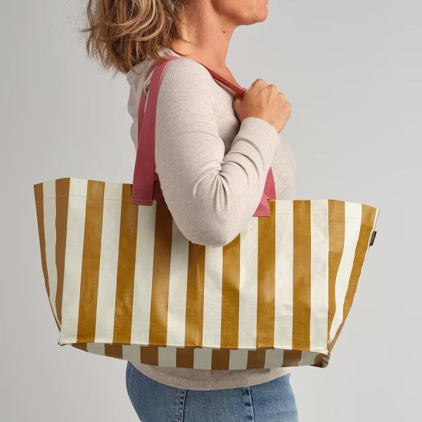 A strong, lightweight tote is im<em></em>portant when you head out with the family. — ikea.com/my