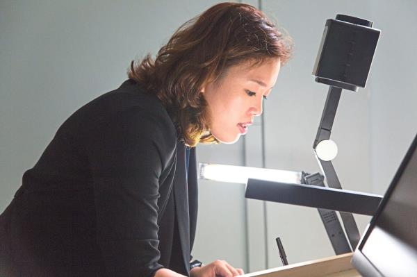 Ho preparing for her presentation. Photo: Dr Ho Weang Kee