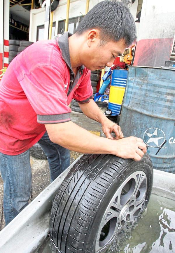 Keep it rolling: Tyre dealerships in Malaysia are facing a crisis in succession as ageing technicians struggle to find their replacements among the younger generation.