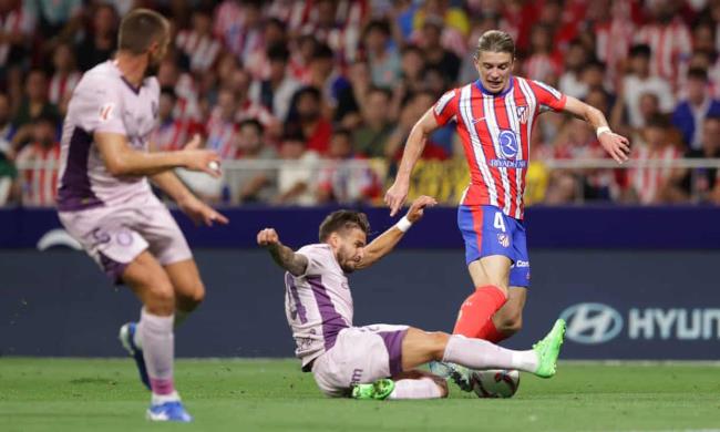 Koke and ángel Correa celebrate Atlético Madrid’s third goal.