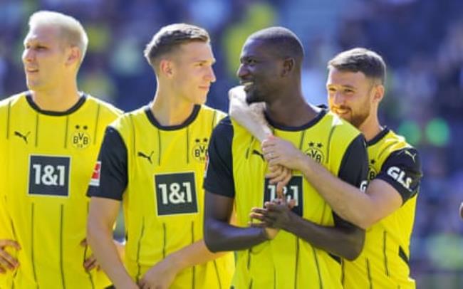 Dortmund’s Niklas Süle, Nico Schlotterbeck, Serhou Guirassy and Salih ?zcan before the pre-season friendly against Aston Villa