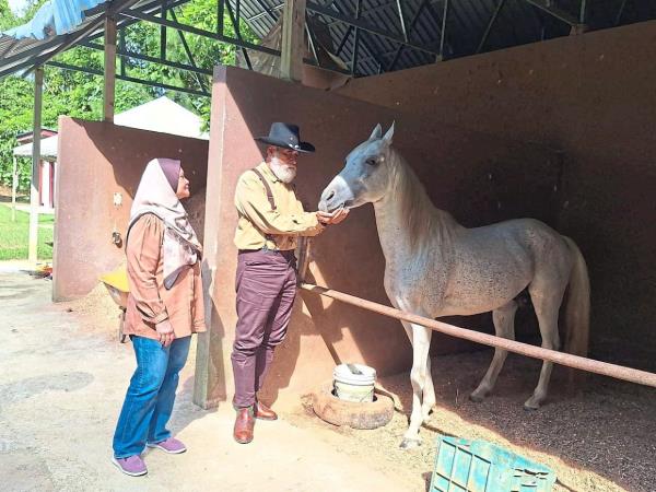 Nek Abdul Rahman and Norhayati moved from the city to Bentong so they could embrace the cowboy lifestyle.